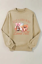 Tan graphic round neck long sleeve sweatshirt with fall girl design