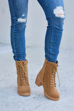 Tan suede block heel boots with lace-up and zipper detail