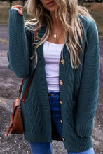 Teal cable knit cardigan with wooden buttons and pockets
