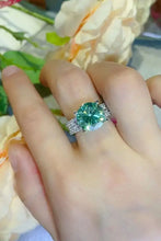 Teal Carat Moissanite Sterling Silver Band Ring with Emerald Halo