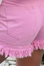 Teal high waist denim shorts with raw frayed hem and pocket detail