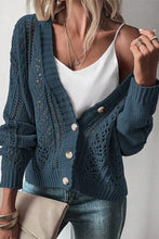 Teal open-front knit cardigan with lace detailing, buttons, and pockets