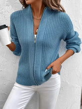 Teal ribbed zip-up cardigan with balloon sleeves and pockets