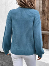 Teal ribbed zip-up cardigan with balloon sleeves, mock neck and pockets