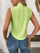 Lime green ribbed texture turtleneck sleeveless top with high neckline ideal for stylish layering and casual wear