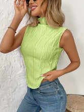 A vibrant lime green texture turtleneck sleeveless top with high neckline and textured fabric for stylish wear