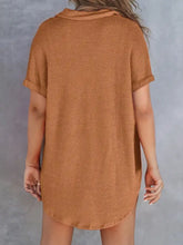 A cozy rust-colored textured knit button dress with waffle knit fabric short sleeves collar and high-low hemline