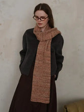 Textured knit scarf in mottled reddish-brown ribbed style