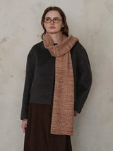 Light brown textured knit scarf with fringed ends and reddish-brown ribs