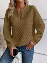 Olive green textured notched raglan sleeve sweatshirt with v-neck and button detail in slightly stretchy material