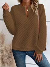 A cozy brown textured notched raglan quilted knit sweatshirt with a subtle diamond pattern and keyhole neckline machine wash cold