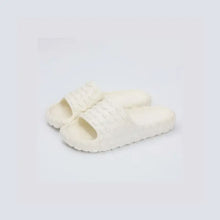 Pair of off-white textured open toe platform slippers in beige and white