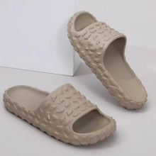 Beige textured open toe platform slippers with embossed pattern
