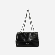 Textured PU leather shoulder bag with silver-tone clasp and chain strap
