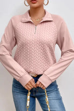 Women’s pink textured quarter zip long sleeve sweatshirt