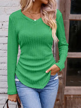 Women’s textured ruched long sleeve V-neck green top