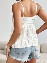White textured sweetheart neck cami top with thin straps and gathered waistband for stylish casual wear