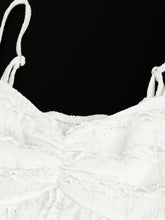 White lace sweetheart neck cami with delicate ruffled detailing and thin straps in a textured sweetheart design