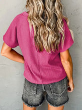 Magenta textured V-neck short sleeve T-shirt with crinkled fabric