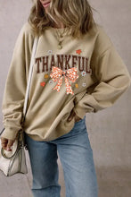Beige thankful bow round neck long sleeve sweatshirt with floral bow and daisy details