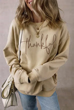Thankful round neck long sleeve sweatshirt in beige with script thankful text