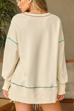 Cream-colored oversized thanksgiving graphic crew neck sweatshirt with teal navy trim, machine wash cold tumble dry low