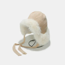 Beige knit thermal tied fuzzy winter hat with white faux fur trim