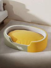 Thickened oval plush pet nest in yellow and sage green with good luck text