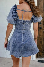 Denim mini dress with square neck puff sleeves and tie-back detail in classic blue denim fabric