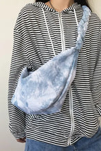 Tie-dye blue and white canvas sling bag with ruched strap