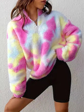 Tie-dye fuzzy quarter zip sweatshirt in pink yellow and white with vibrant pattern made of slightly stretchy material