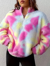 A cozy tie-dye fuzzy quarter zip sweatshirt in pastel pink yellow and light blue made of slightly stretchy material