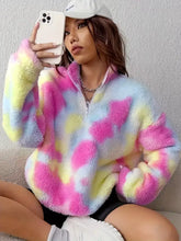 Tie-dye fuzzy quarter zip sweatshirt in pastel pink yellow and blue made of slightly stretchy fleece material