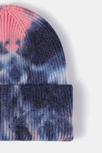 Tie-dye woolen beanie hat in pink, blue, yellow, and orange hues