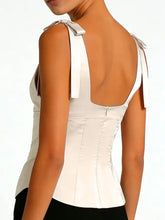 White satin tie shoulder corset top with shoulder bows made of smooth satin fabric for elegant wear