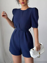 Navy blue tie waist short sleeve romper with puff sleeves