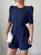 Navy blue tie waist short sleeve romper with puff sleeves