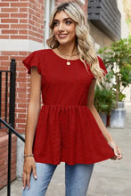 Women’s red short-sleeved tied ruffled round neck peplum T-shirt with eyelet details
