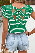 Tied striped V-neck cap sleeve T-shirt with back tie bow and denim shorts
