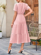 Pink tiered notched short sleeve dress with ruffles and v-neckline