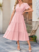 Pink tiered notched short sleeve dress with ruffles and V-neckline