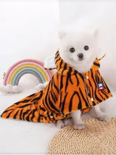 Tiger pet hoodie with ears: orange black tiger-striped polyester fleece coat on small white dog