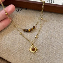 Tiger’s eye copper double layered necklace with gold sun pendant