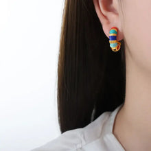 Titanium steel enamel hoop earrings with colorful bands and detailing