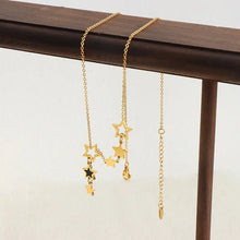 Gold-tone titanium steel geometric drop necklace with star charms, 18-inch chain