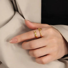 Gold-toned titanium steel layered wrap ring with open-ended design