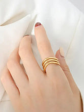 18k gold-plated titanium steel three-layered ring on finger