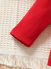 Red fringed cotton throw blanket with woven pattern and toddler girl ladybug pants set