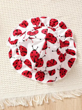 Children’s cartoon top and pants set with white sun hat and red ladybug print