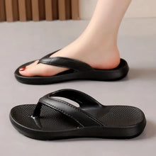 Black toe post flats slippers with cushioned soles and textured footbeds